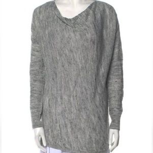 Vince sweater. Grey color with texture . Long sleeved. Size small.